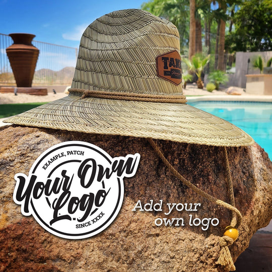 Single Track Hats natural straw sun hat with a custom leatherette patch and rope strap, perfect for beach vacations.
