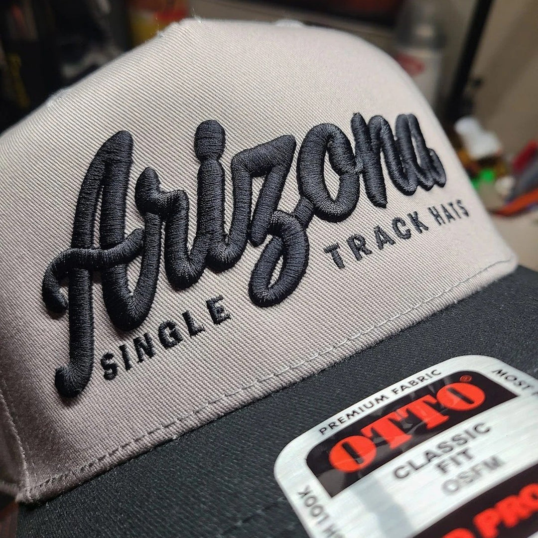 Close-up of the raised 3D puff Arizona script embroidery